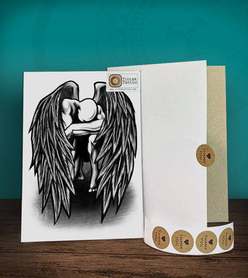 Tintak temporary tattoo sticker with fallen angel design, with its hard board packaging.