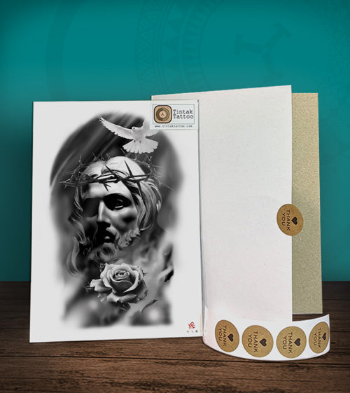 Tintak temporary tattoo sticker with Jesus design, with its hard board packaging.