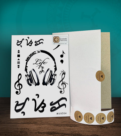 Music is life temporary tattoo sticker designs with gclef, fclef, and baybayin word design, with its packaging.