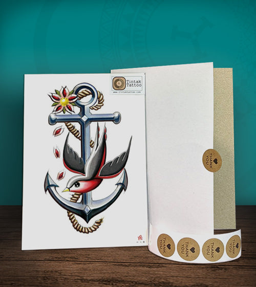 Tintak temporary tattoo sticker with anchor design, with its hard board packaging.