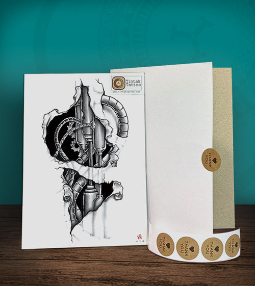 Temporary tattoo sticker with Biomech design with its hard board packaging.