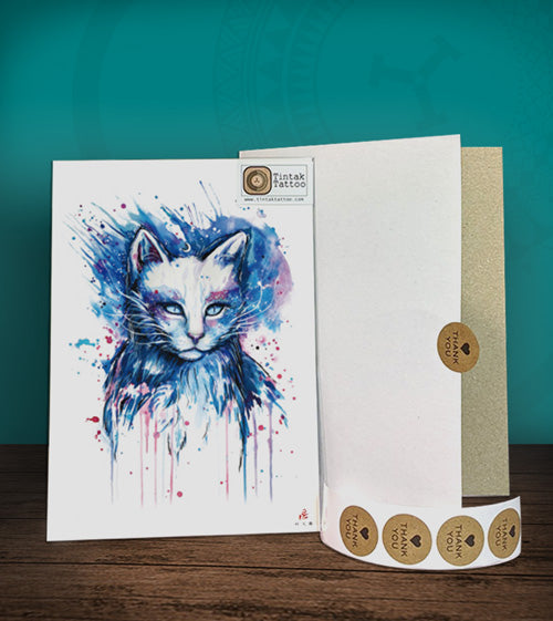 Tintak temporary tattoo sticker with water-colored cat design, with its hard board packaging.