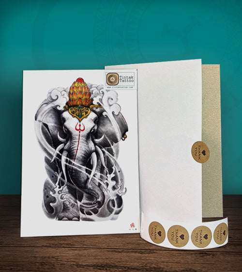 Tintak temporary tattoo sticker with elephant design, with its hard board packaging.