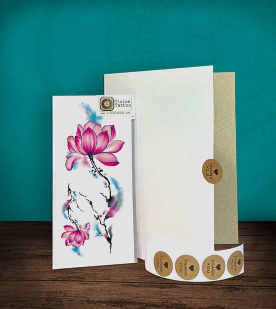 Tintak temporary tattoo sticker with lotus flower design, with its hard board packaging.