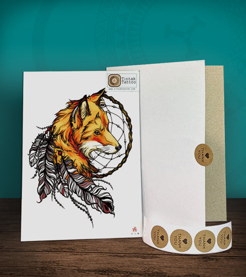 Tintak temporary tattoo sticker with fox dream catcher design, with its hard board packaging.