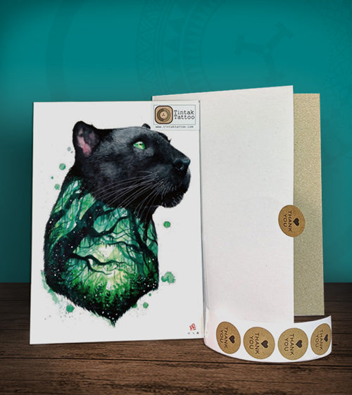 Tintak temporary tattoo sticker with panther design, with its hard board packaging.