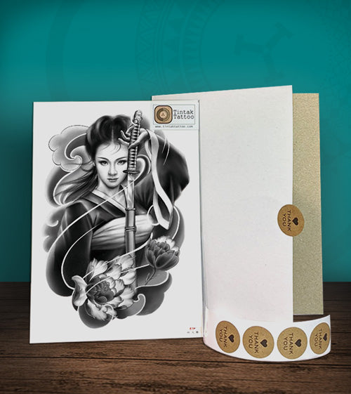 Tintak temporary tattoo with a samurai woman design, with its hard board packaging.