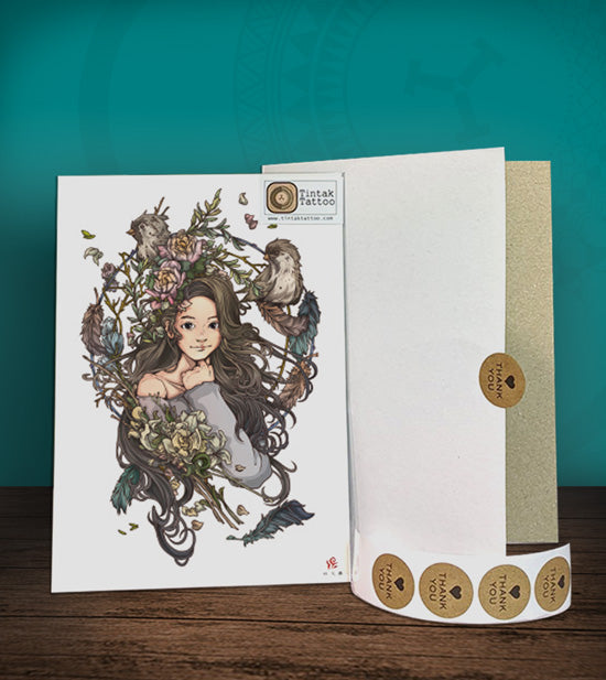 Tintak temporary tattoo sticker witha woman and flower design, with its hard board packaging.