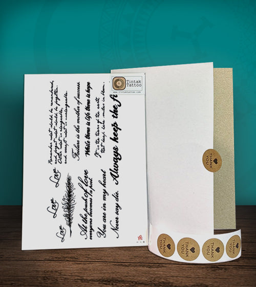 Tintak temporary tattoo sticker with written words design, with its hard board packaging.
