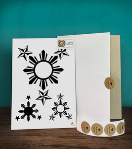 Tintak temporary tattoo sticker with 3 stars and a sun design, with its hard board packaging.