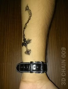 3D cross chain temporary tattoo on a man's arm.