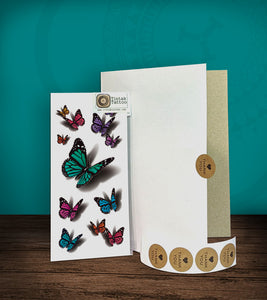 Tintak temporary tattoo sticker with 3D butterfly designs, with its hard board packaging.