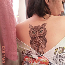 Load image into Gallery viewer, Owl temporary tattoo on woman&#39;s back.