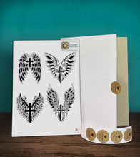 Load image into Gallery viewer, Tintak temporary tattoo sticker with angel wings design, with its hard board packaging.