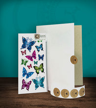 Load image into Gallery viewer, Tintak temporary tattoo sticker with butterfly designs, with its hard board packaging.