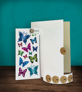 Tintak temporary tattoo sticker with butterfly designs, with its hard board packaging.