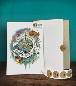 Tintak temporary tattoo sticker with compass and waves design, with its hard board packaging.