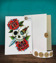Load image into Gallery viewer, Tintak temporary tattoo sticker with dagger, skull and rose design, with its hard board packaging.