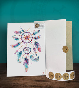 Tintak temporary tattoo sticker with dream catcher design, with its hard board packaging.