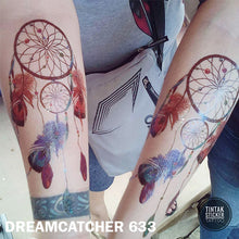 Load image into Gallery viewer, Two arms from a man and a woman showing their dream catcher temporary tattoo sticker.