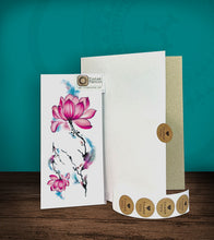 Load image into Gallery viewer, Tintak temporary tattoo sticker with lotus flower design, with its hard board packaging.