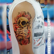 Load image into Gallery viewer, freedom skull, compass and roses Temporary Tattoo Sticker on a man&#39;s arm