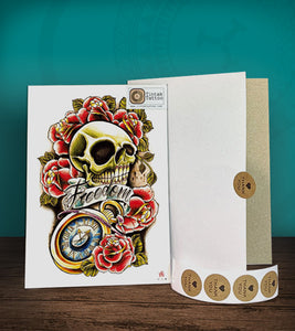 Tintak temporary tattoo sticker with skull and roses design, with its hard board packaging.