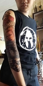 Lady luck full sleeve temporary tattoo on man's arm.