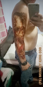 Full sleeve temporary tattoo on a man's arm with monkey king design.