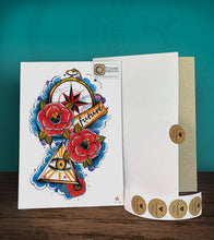 Load image into Gallery viewer, Tintak temporary tattoo sticker with the eye, roses, and compass design, with its hard board packaging.