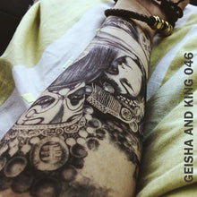 Load image into Gallery viewer, Geisha and King temporary tattoo design placed on an arm with bracelets.