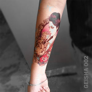 Geisha temporary tattoo on a women's arm.
