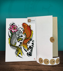 Tintak temporary tattoo sticker with koi fish design, with its hard board packaging.