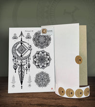 Load image into Gallery viewer, Mandala Temporary Tattoo Design 109 with its hard-board packaging.