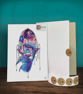 Tintak temporary tattoo with mermaid design, with its hard board packaging.