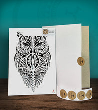Load image into Gallery viewer, Tintak temporary tattoo sticker with polynesian tribal owl design with its hard board packaging.