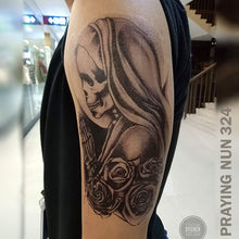 Load image into Gallery viewer, Praying skeleton nun temporary tattoo on a man&#39;s arm.