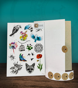Tintak temporary tattoo with bird and flower designs, with its hard board packaging.