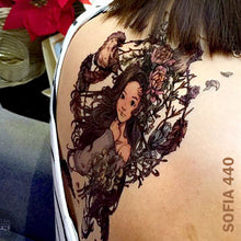 Load image into Gallery viewer, Woman&#39;s back with temporary tattoo sticker - animated girl inside the circled flowers with birds and feathers.