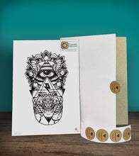 Load image into Gallery viewer, Tintak temporary tattoo sticker with the eye of providence design beside its packaging.
