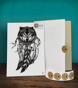 Tintak temporary tattoo sticker with wolf dream catcher design, with its hard board packaging.