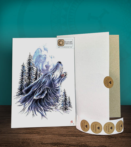 Tintak temporary tattoo sticker with wolf design, with its hard board packaging.