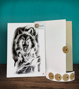 Tintak temporary tattoo sticker with wolves design, with its hard board packaging.